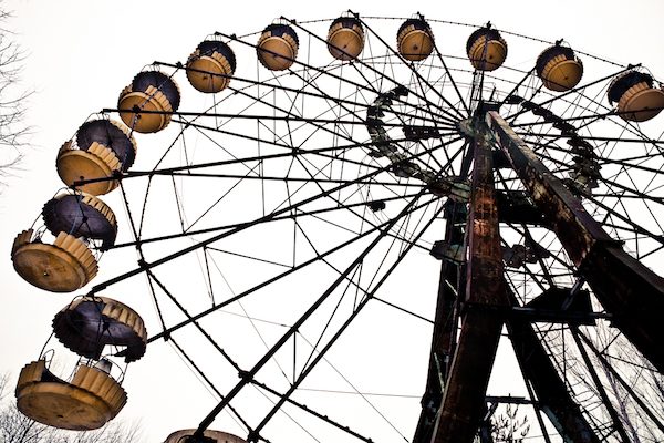 One of the most iconic images from the town is the Ferris wheel in central Pripyat. The amusement park was due to open five days after the disaster, and thus was never used. Time appears to have stood still in a fair ground which should have seen children playing.