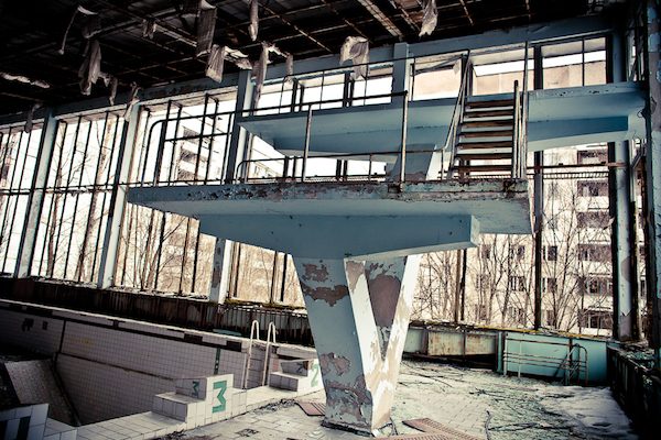 The public swimming baths were once filled with cries of excitement from children. But now the swimming pool has remained desolate for decades, as a 19- mile exclusion zone still remains around the Chernobyl plant.