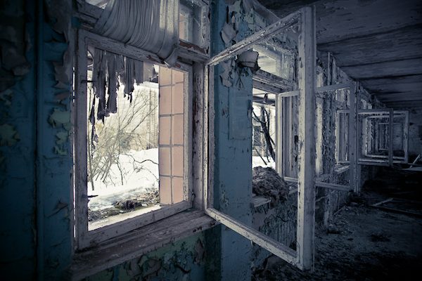 The disaster began at Chernobyl reactor number four, when a power surge occurred during a systems test, causing a series of steam explosions and a fire which sent a plume of radioactive material into the air.