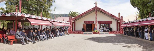 The Turangawaewae Marae, the sacred complex for the Maoris and HQ for the Maori King. The Maori King can be seen seated beside the Khalifah of the Promised Messah in this historic meeting.