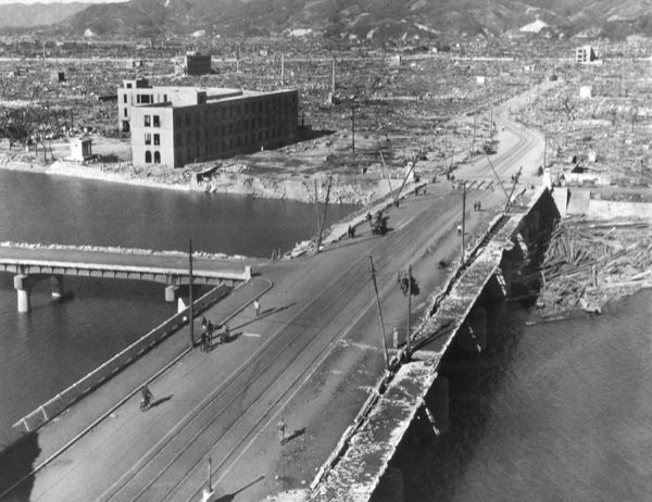 Hiroshima about a month after the Atomic Bombing of August 6, 1945. View from roof of Chamber of Commerce building. Some people walk amid the ruins. Ca. Sept.-Oct. 1945. © Everett Historical | Shutterstock