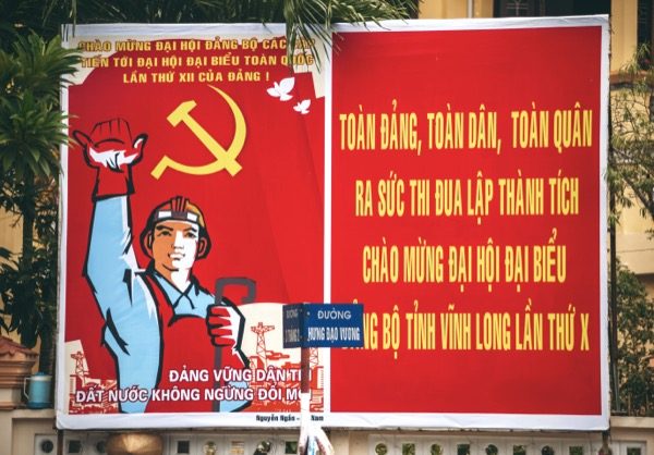 Image of a sign in Saigon, Vietnam. The Communist party would x elections so that their party was constantly in power showing propaganda messages to gain support from the mass public. Only political organisations a liated with the Communist Party were allowed freedom to in uence the citizens. © klublu | Shutterstock.com