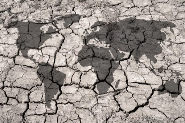 Climate change is one of the threats facing the world today, and not only from an environmental perspective. Attempts to reduce carbon emissions also hamstring developing economies—thus providing another source of world friction and instability. © Science Photo Library | Shutterstock