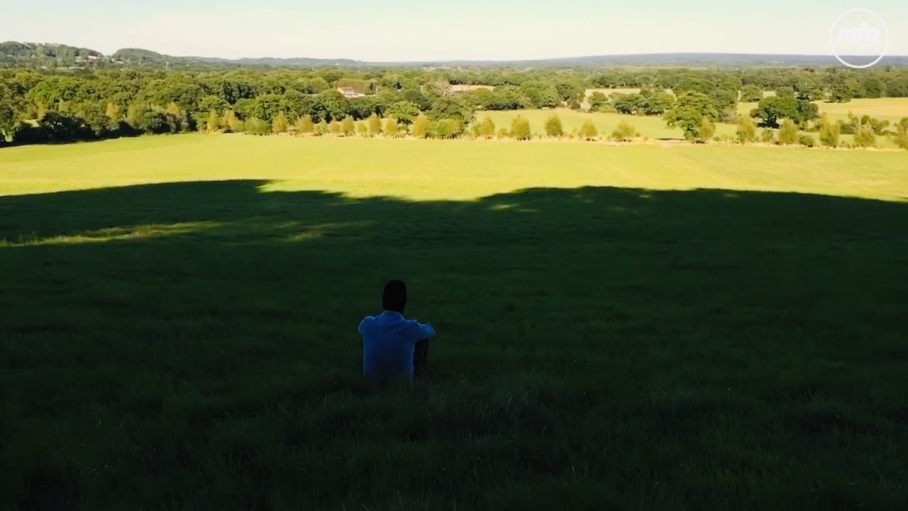 Missionary Raza Ahmed looks out onto the empty UK Jalsa site in Hadeeqatul Mahdi.