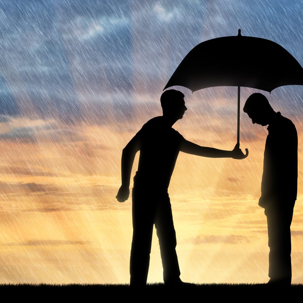 man holding umbrella