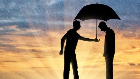 man holding umbrella